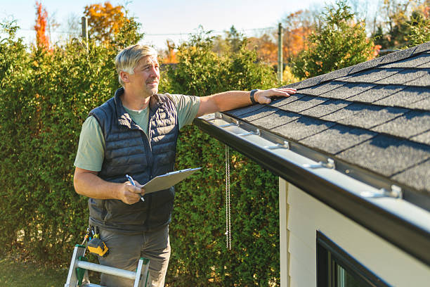 Professional Roof Replacement technician working in Shelby, MS